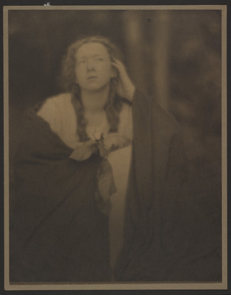 [Young Woman in Pigtails with Shawl Around Her Shoulders]