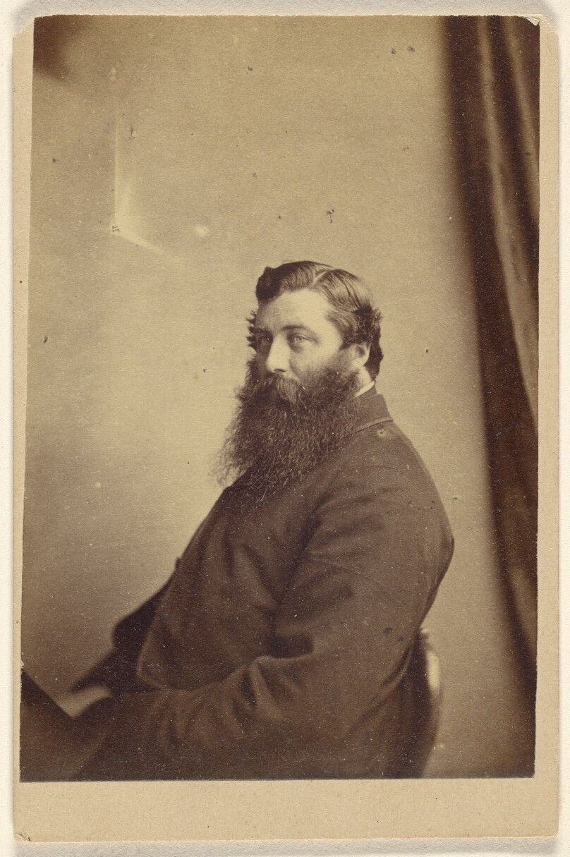 [Unidentified man with long beard, in 3/4 profile, seated]