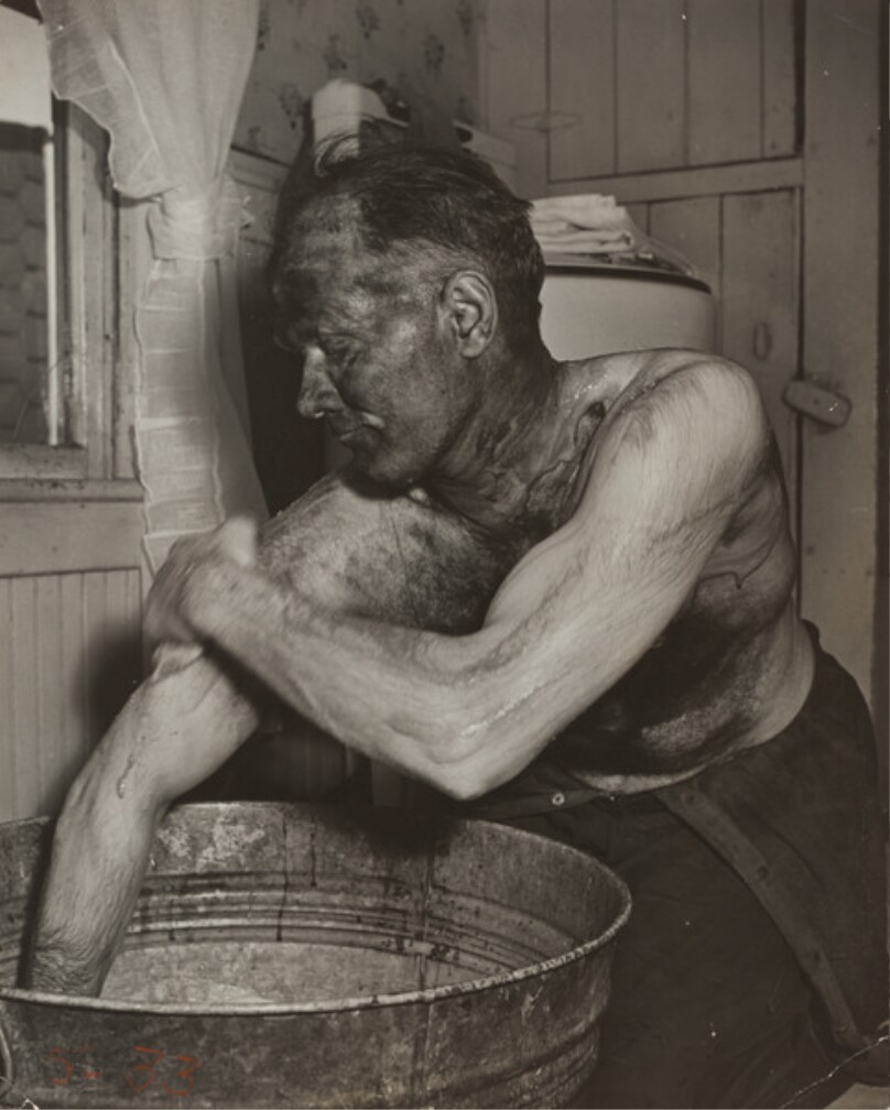 Coal Miner Mabrey Evans Scrubbing His Arm in Tub. Nanty Glo, PA.