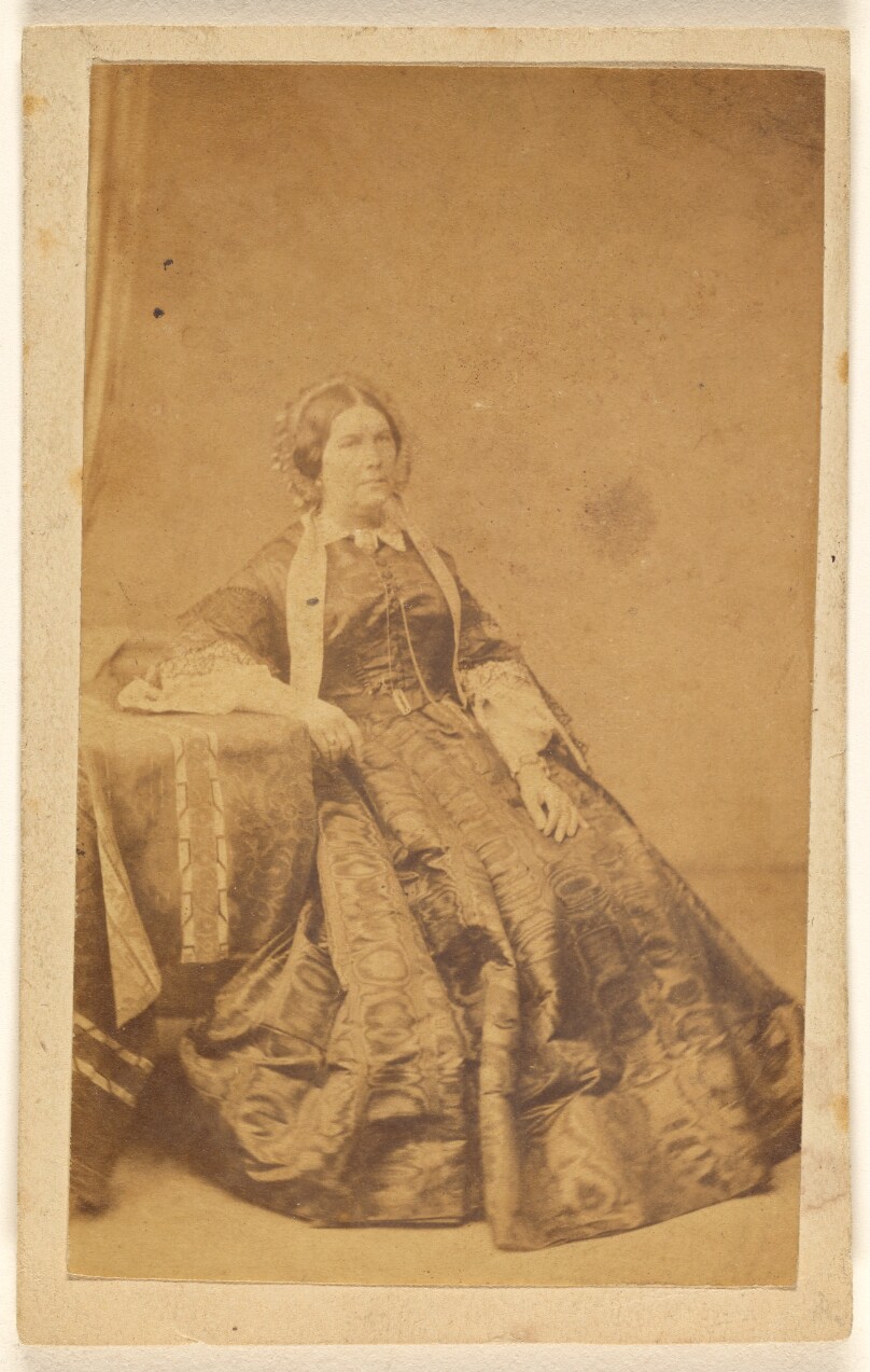 [Unidentified woman, seated]