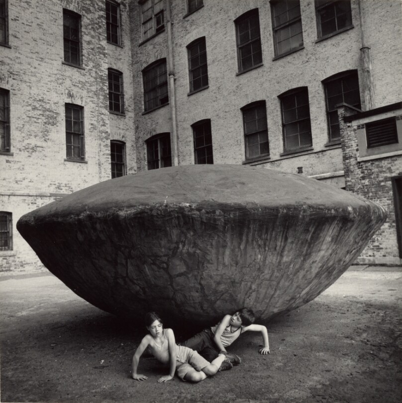 Boy and Girl Under Giant Saucer, Queens, NY