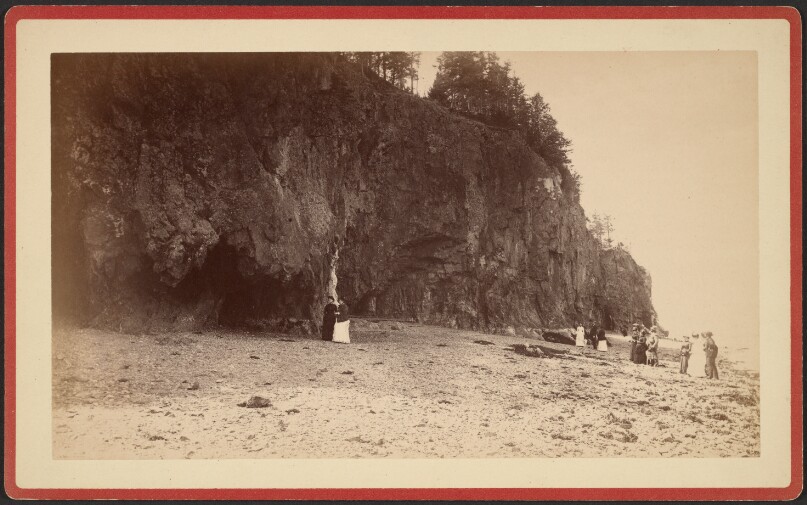 [Group of people on shoreline near cliffs, possibly at Mt. Desert, Maine]