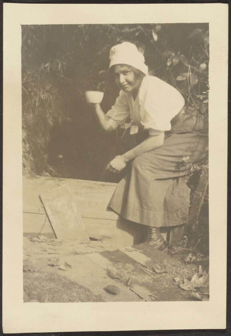 [Woman in Garden with Tea Cup]