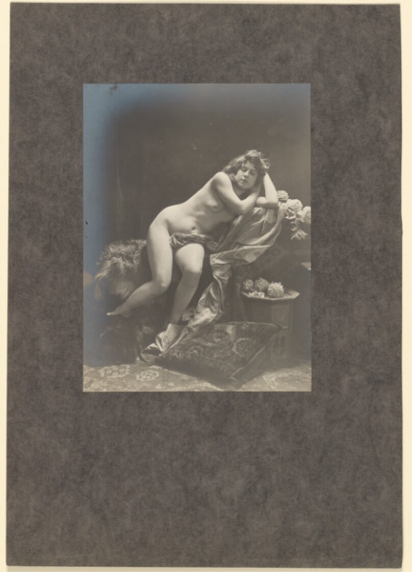 [Draped female nude]
