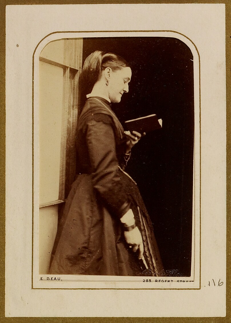 [Portrait of woman reading a book]