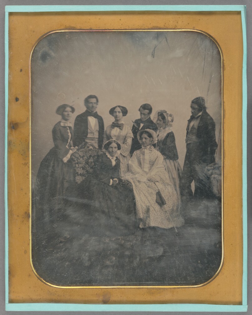 [Family portrait of eight people]