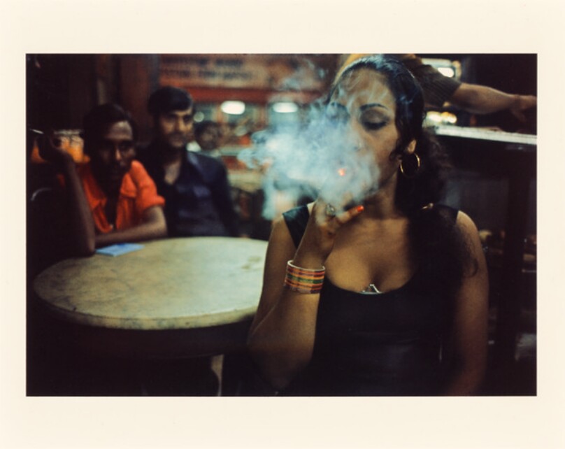 Transwoman smoking in the Olympia Cafe, Falkland Road, Bombay, India
