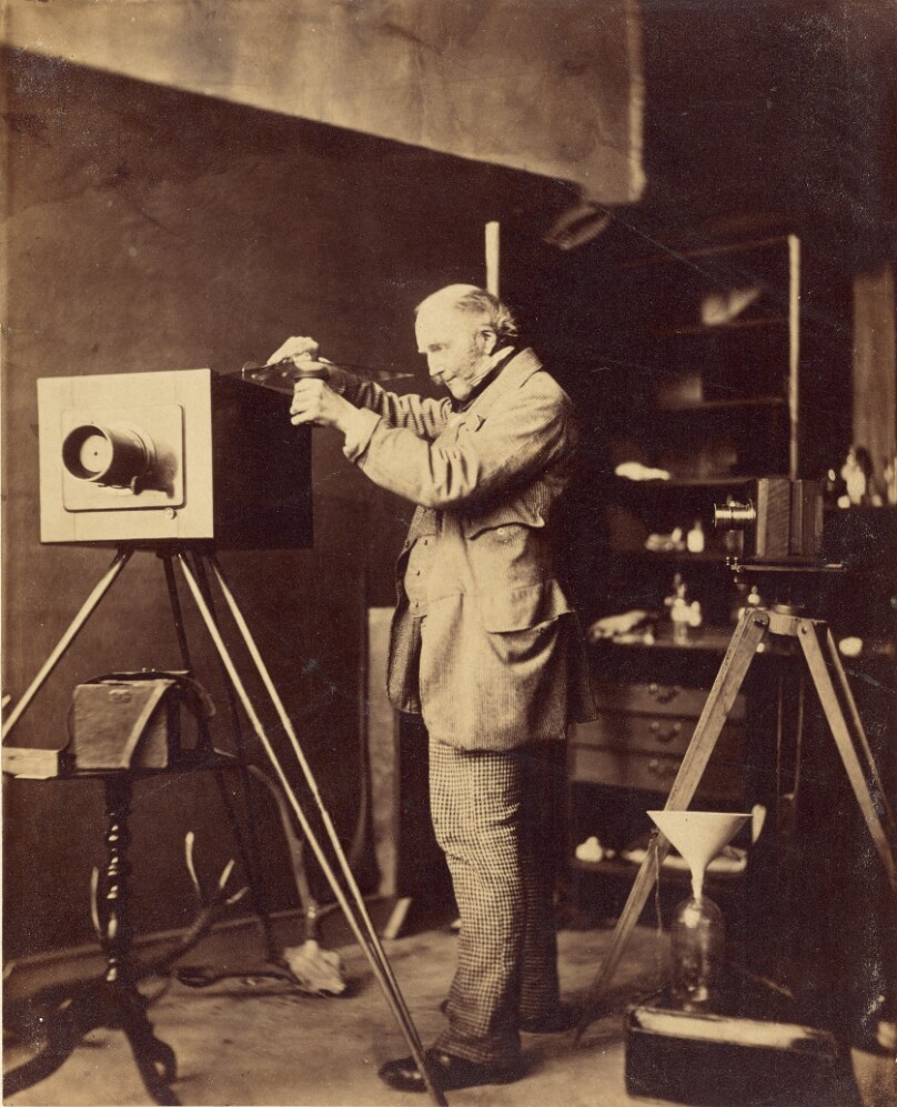 [Self-portrait preparing a Collodion plate]