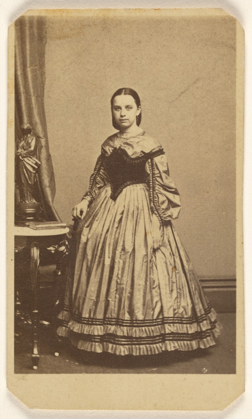 [Unidentified woman, standing]
