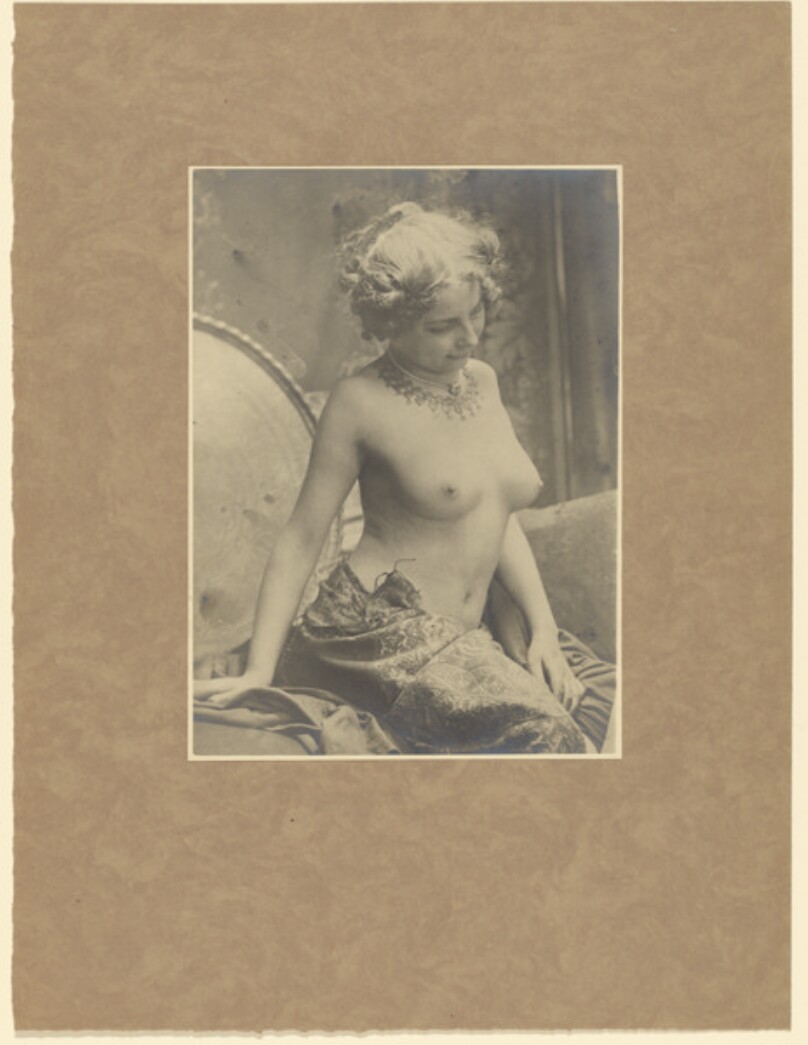 [Draped female nude]