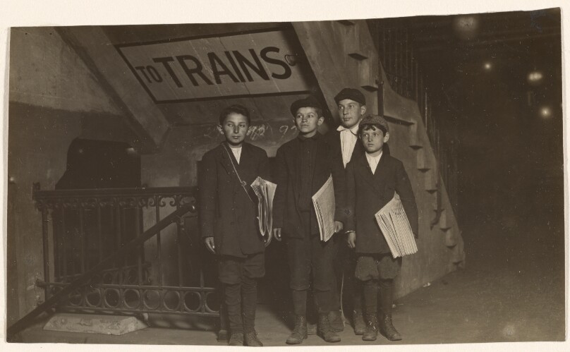 [Four Newsies at an Entrance to the Subway, New York City]