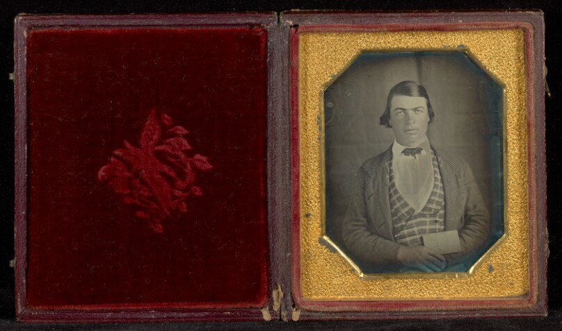 [Portrait of Young Man Holding Map of Mexico]