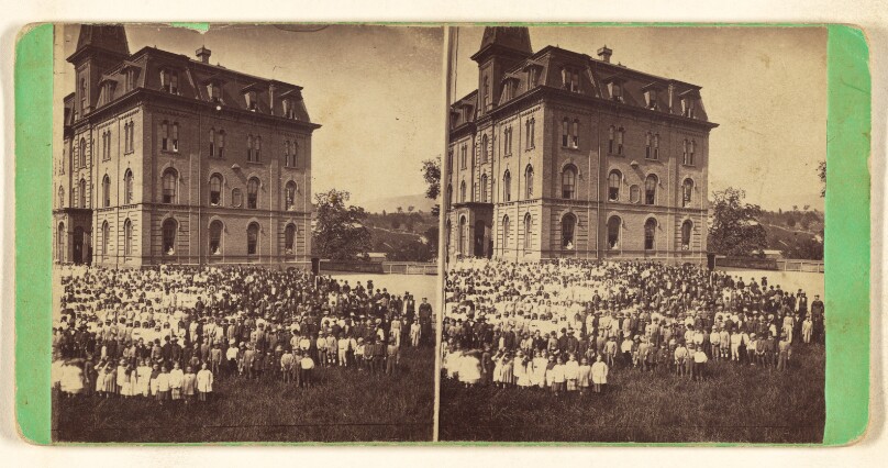 [School children posed in yard with large school or another type of building in background, Hoosac Valley, North Adams, Mass.]