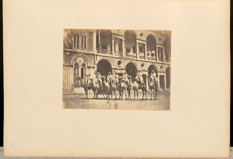 [Men on camelbacks, Egypt]