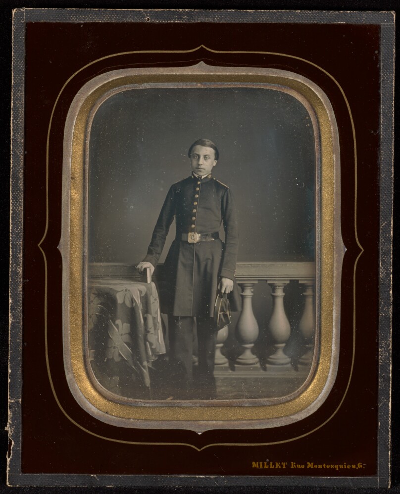 [Portrait of a man in military attire, standing]