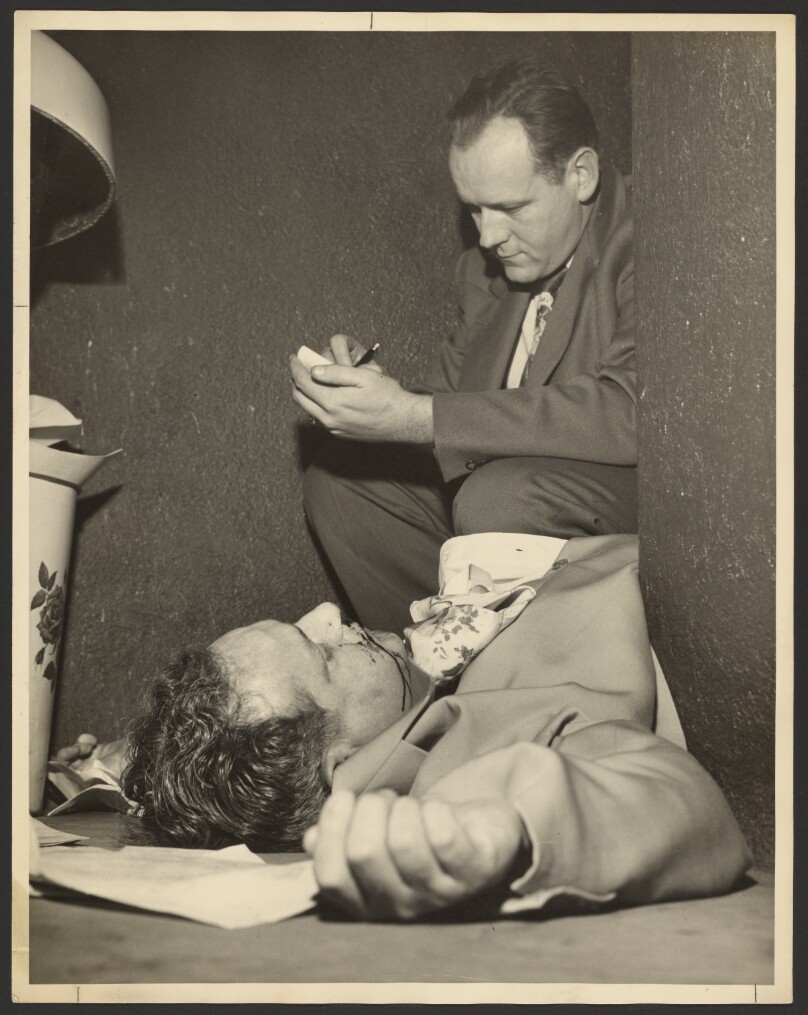 [Detective inspecting restroom murder]