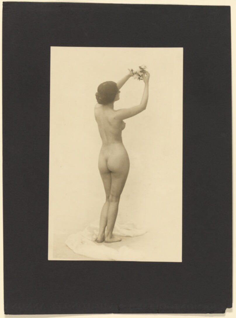 [Female nude with flowers]