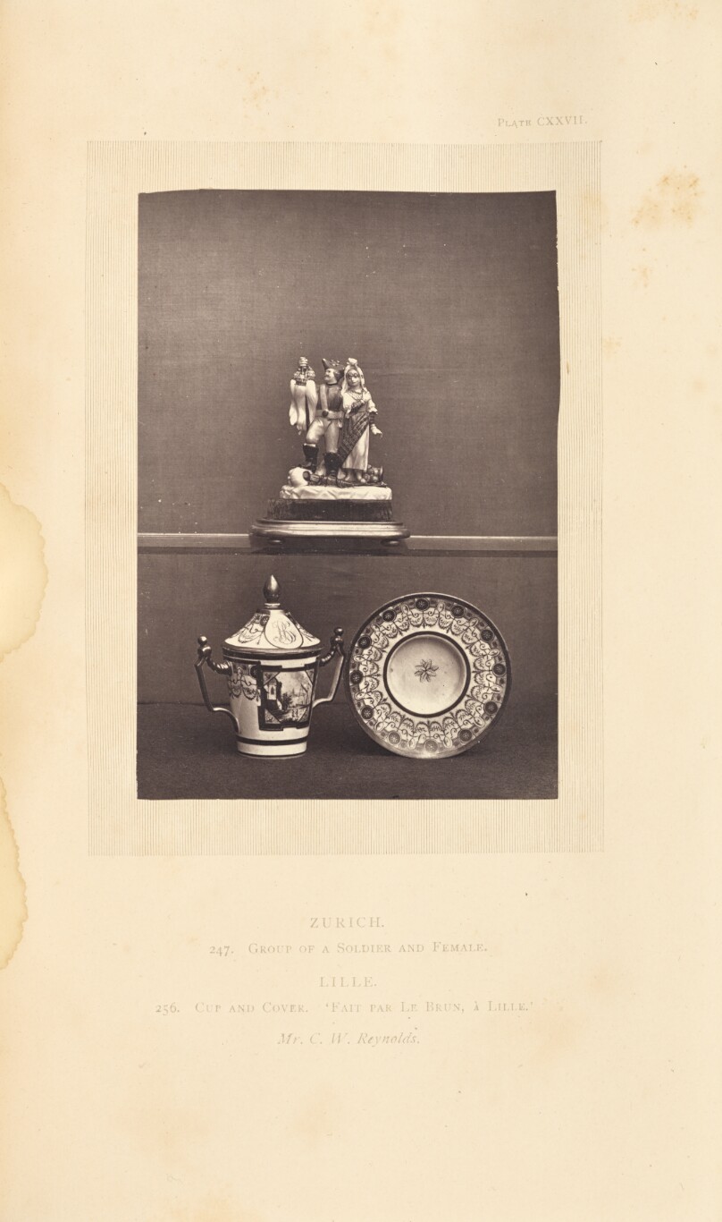 [Figures, cup, and plate]