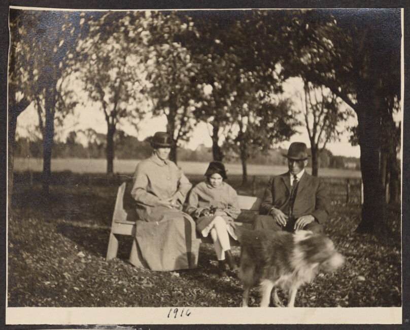 [Group sitting on a bench]