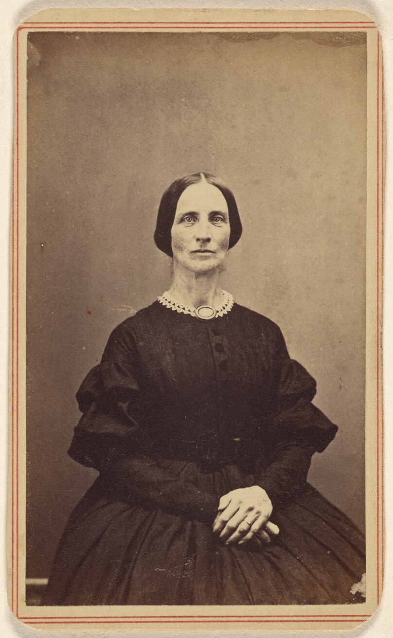 [Unidentified woman, seated]