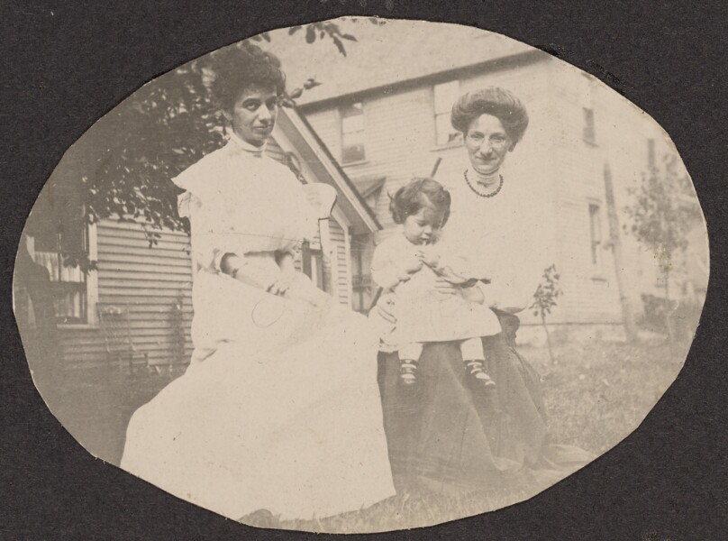 [Women with a young child]