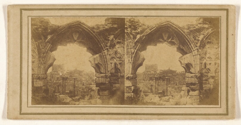 [View of city through Gothic arch]