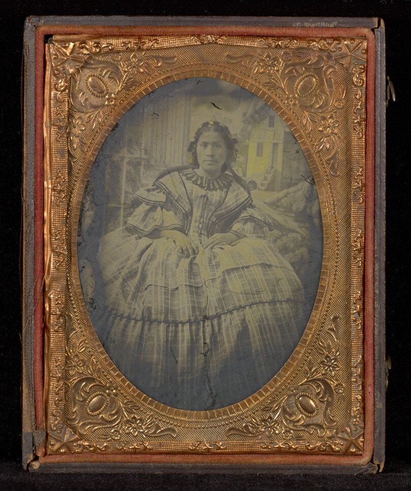 [Portrait of a Woman in a Full-skirted Dress in a Studio with a Painted Background]