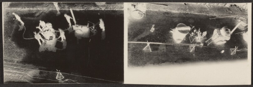 [Contact print-strip from two 37mm film positives: street workers seen from above in negative]
