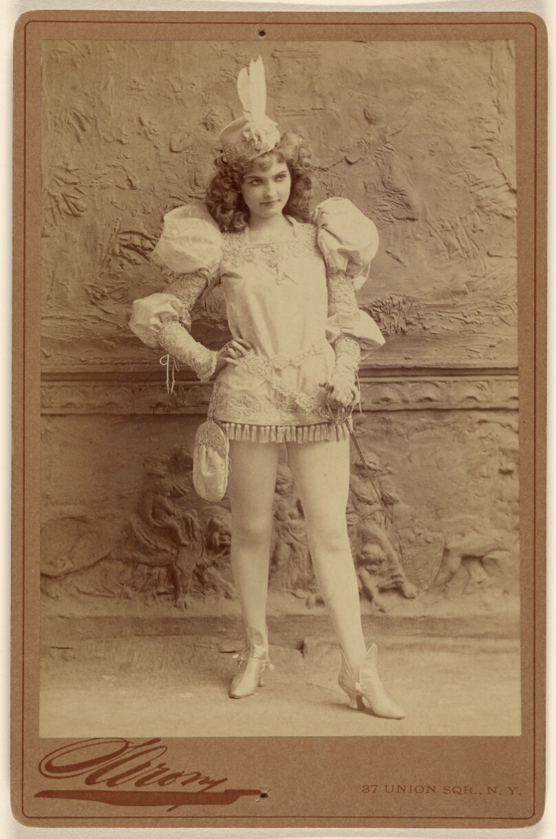 [Unidentified actress in costume, standing]