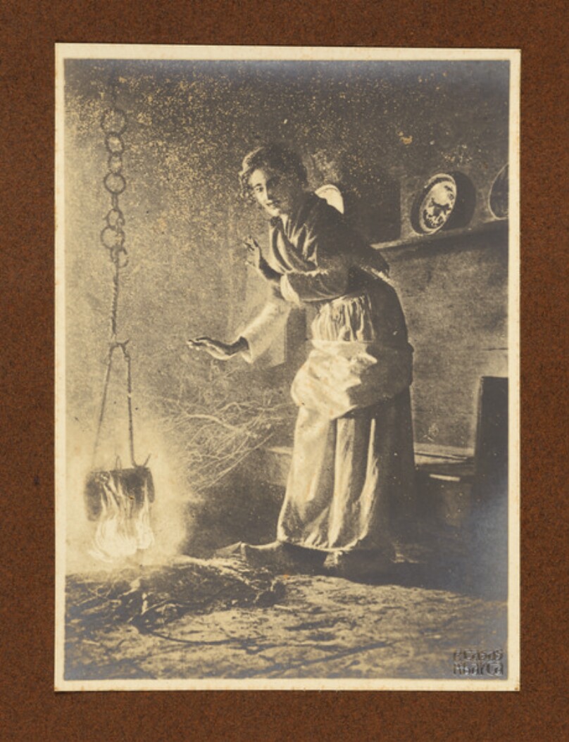 [Cooking over a fire]