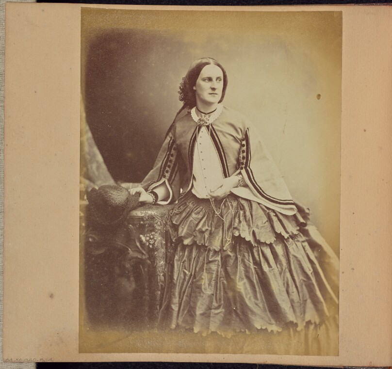 [Portrait of a woman seated in profile]