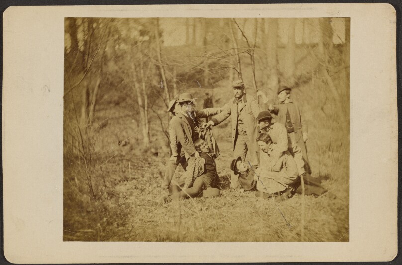 [Nine costumed male students]