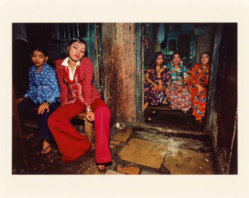 Seated Nepalese girls waiting for customers, Falkland Road, Bombay, India