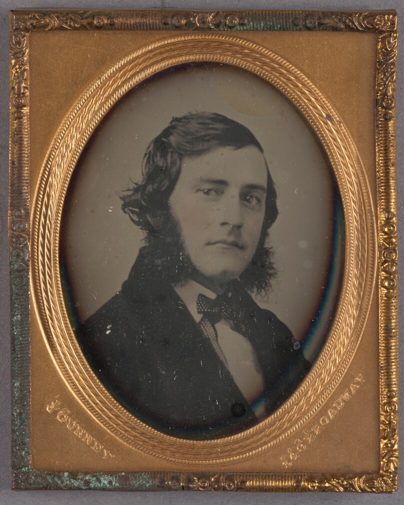 [Portrait of a young man with muttonchop whiskers]