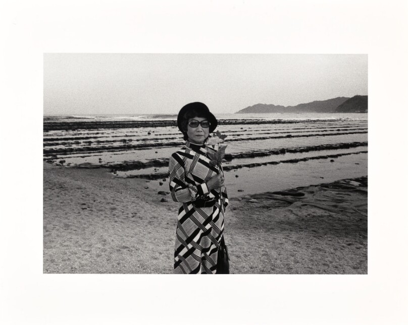 Woman with artificial flowers, Aoshima, Miyazaki
