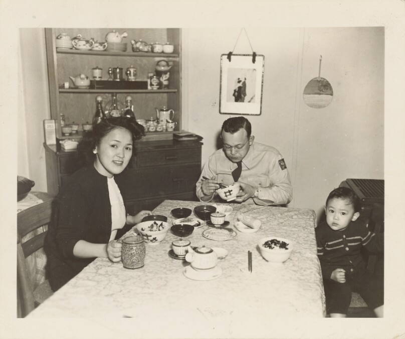 [Family eating meal]