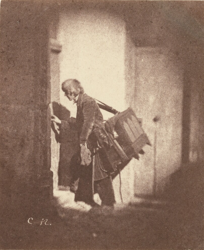 [Organ Grinder at 21, quai Bourbon, Ile Saint-Louis, Paris]