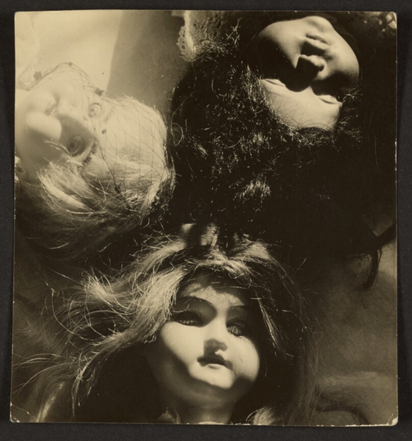 [Heads of Three Dolls]