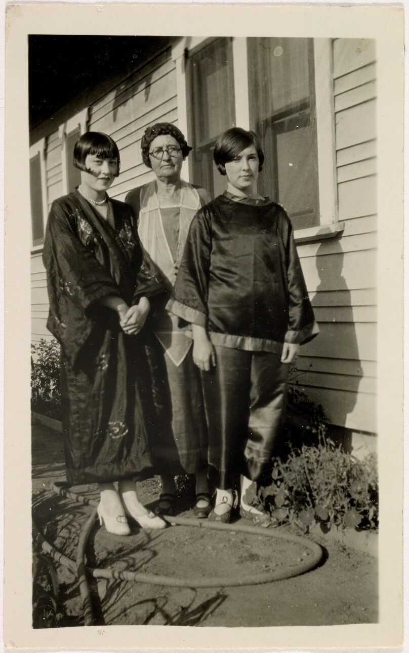 [Three women in costume]