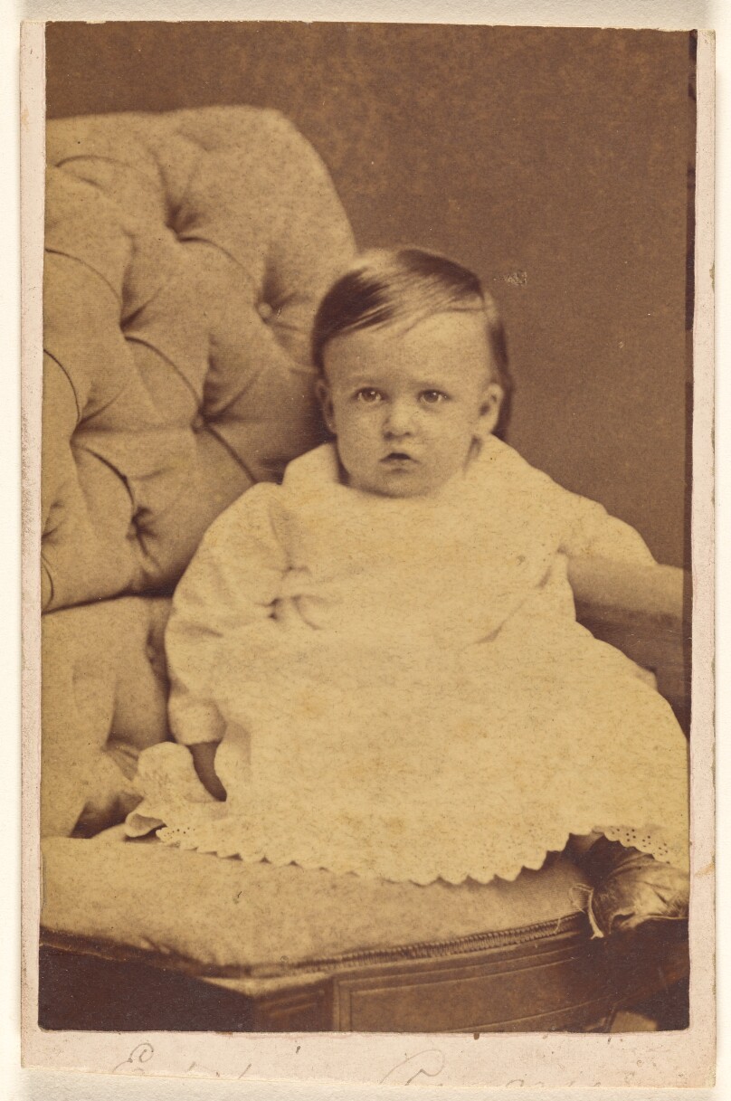 [Unidentified baby seated in a chair]