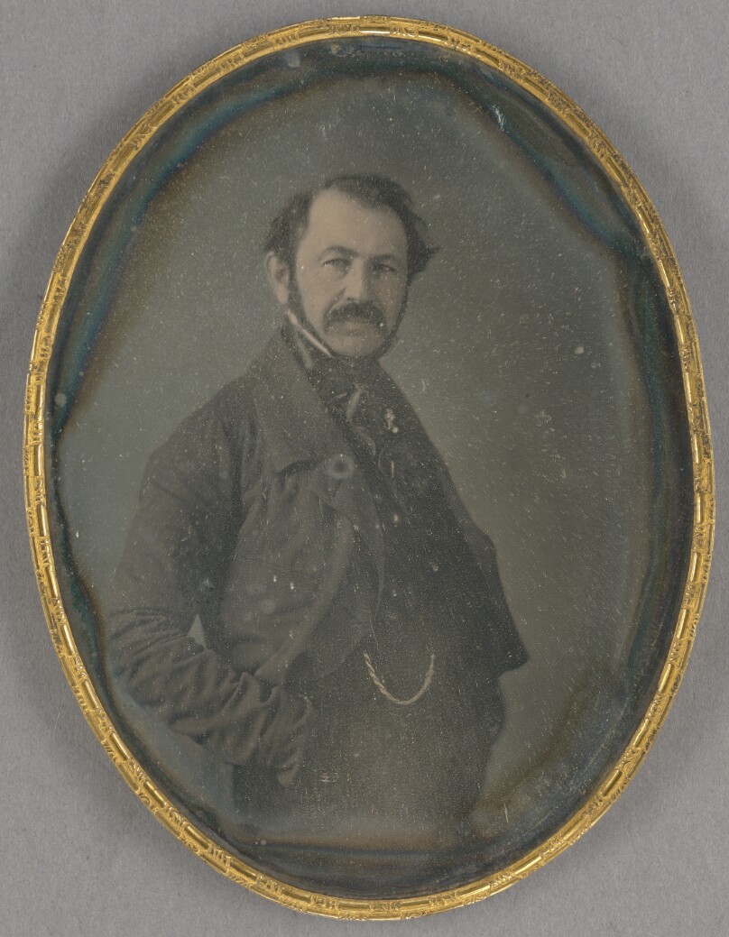 [Portrait of a bearded, middle-aged man]