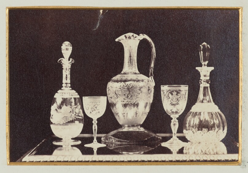 [Two decanters, two goblets and a pitcher]