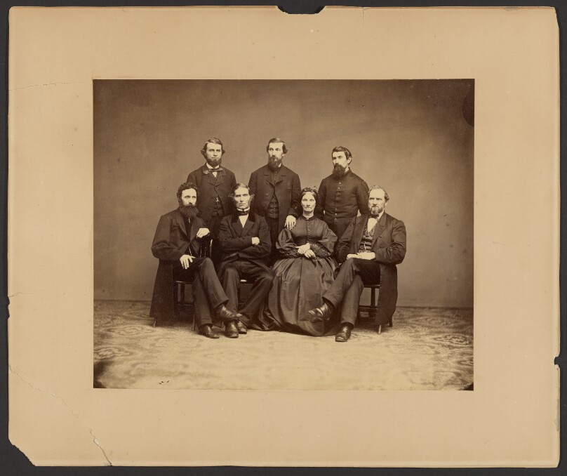 [Group portrait of men and woman]