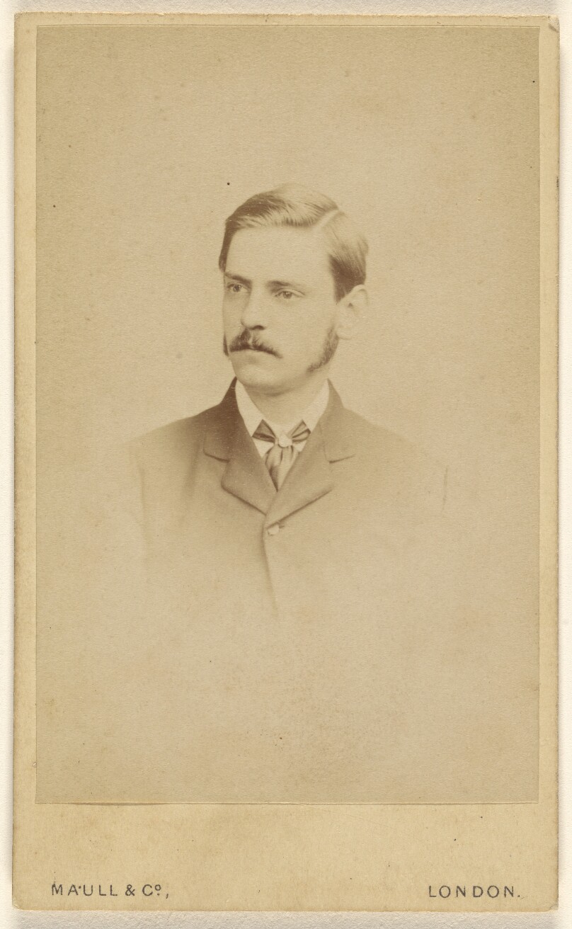 [Unidentified man with moustache, printed in vignette-style]