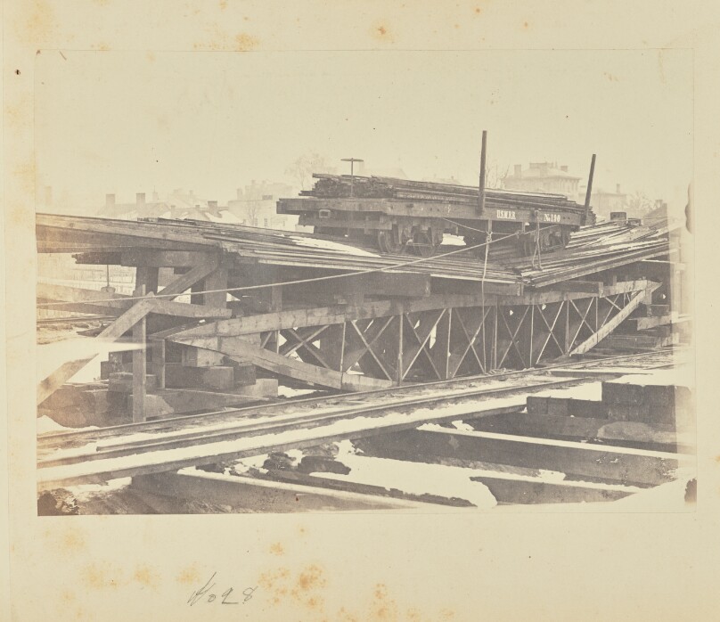 Bridge of Board Trusses Loaded Until it Broke at Two Tons per Foot