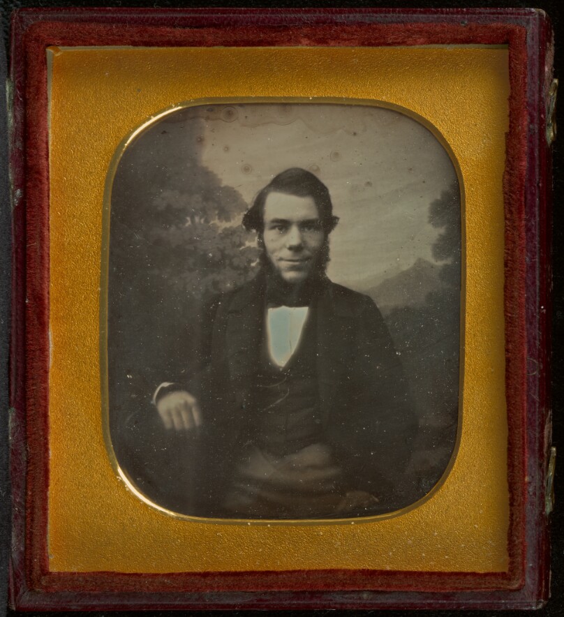 [Portrait of a young man with muttonchop whiskers]