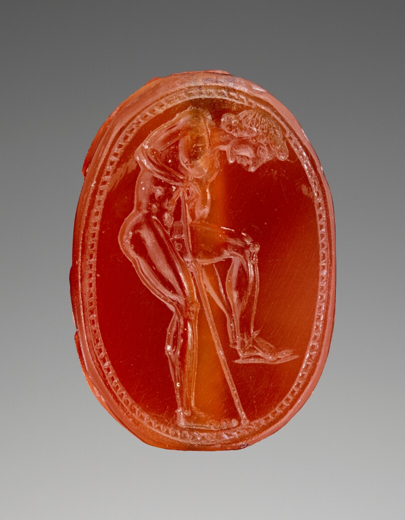 Engraved Scarab with Youth Leaning on a Staff