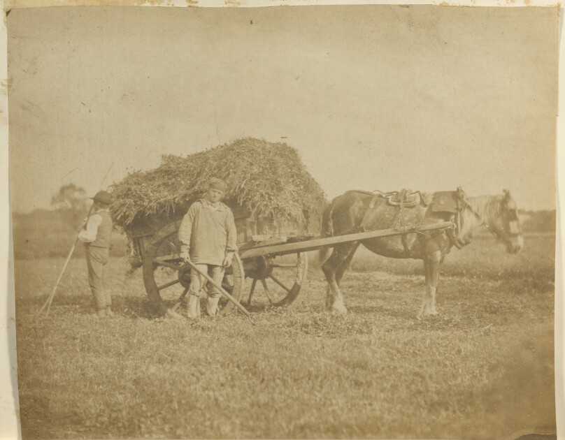 [Man and boy with cart]
