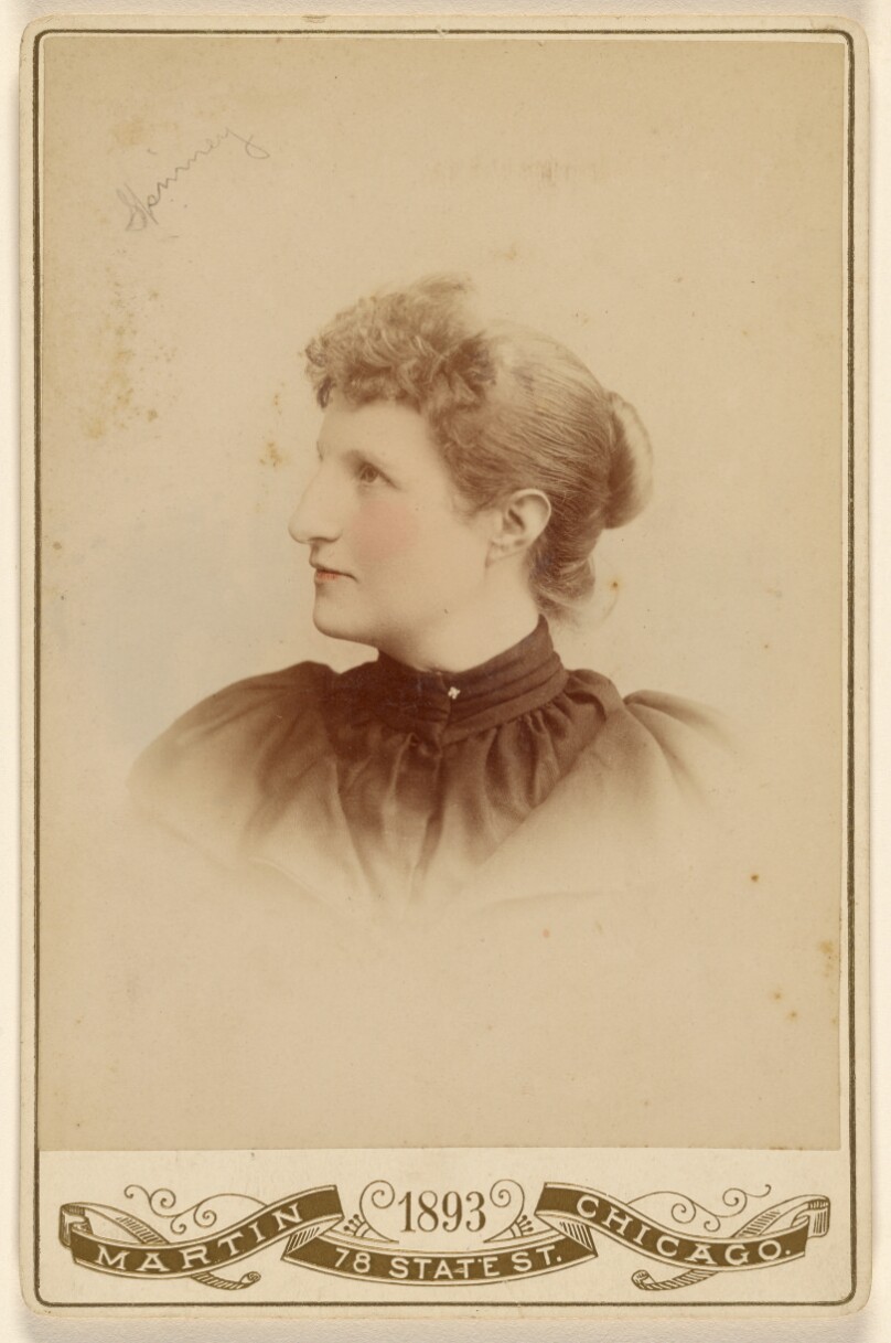 [Unidentified woman, in profile to left]