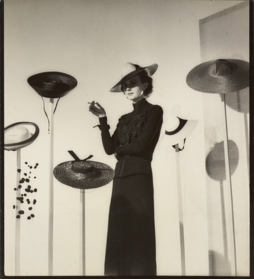 [Model Posing Among Hats, London]